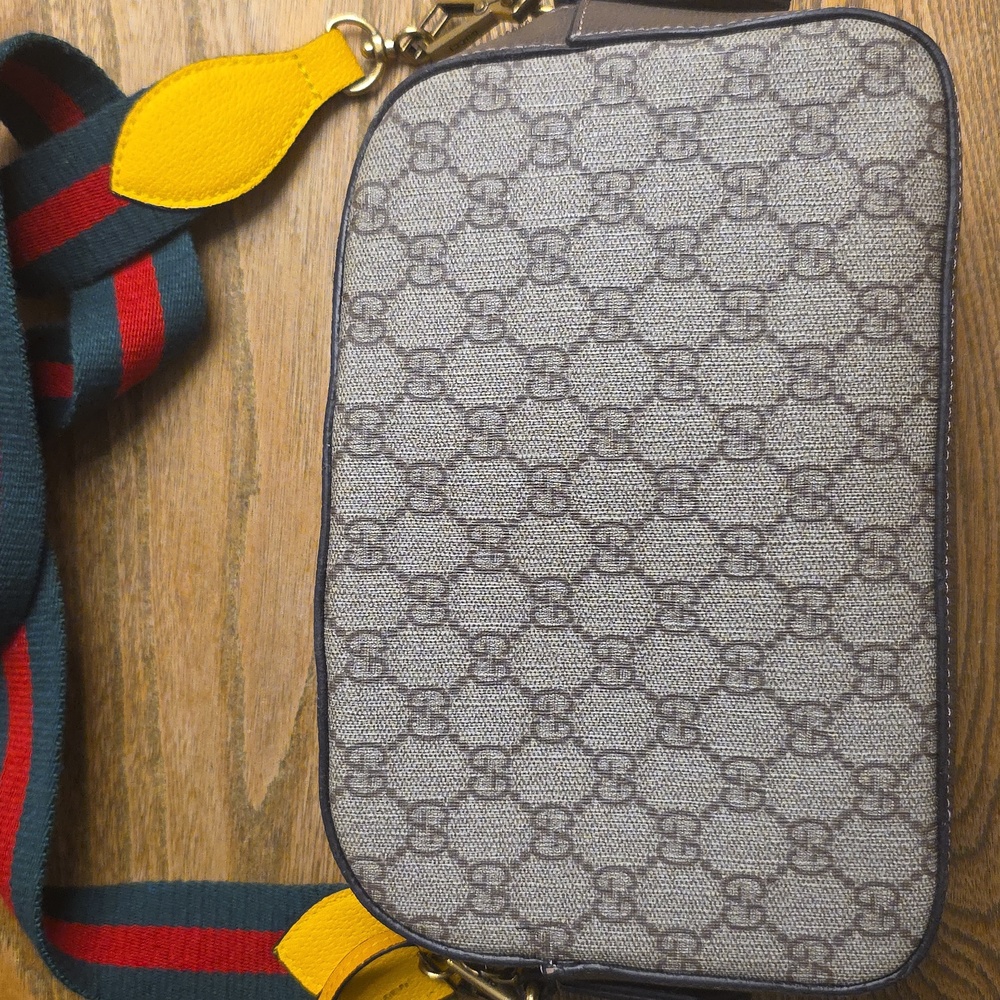 Brown and Yellow Crossbody Bag with Monogram Design